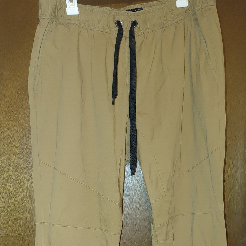 Khaki cargo drawstring pants.